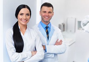 friendly-male-and-female-dentist